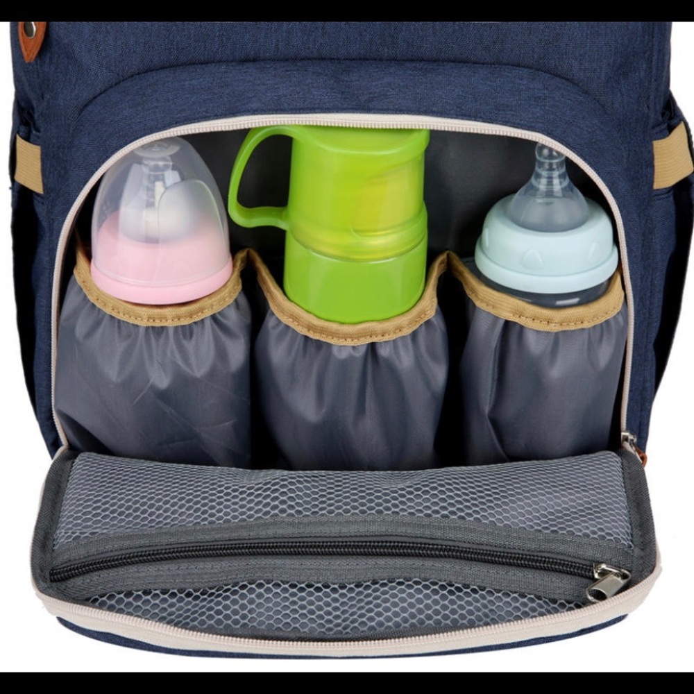 Portable changing and diaper backpack - Picture 6 of 15